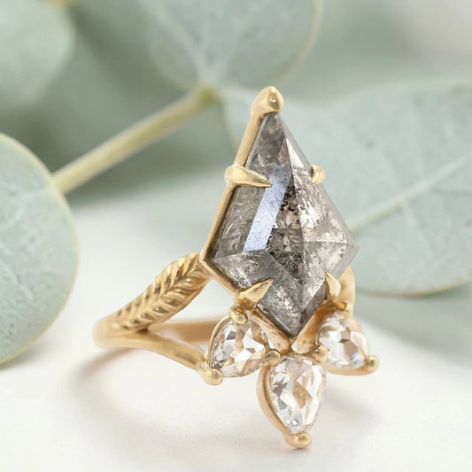 Kite Rose Cut Salt and Pepper Diamond Ring featuring a 5.75 CT natural salt and pepper diamond with galaxy-like inclusions, accented by pear rose cut side diamonds in a handmade split shank nature inspired engagement ring design.