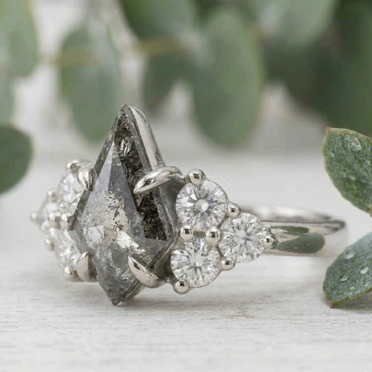Natural Salt and Pepper Diamond Ring featuring a 1.68 CT round rose cut center stone with organic inclusions, accented by lab-grown round diamonds in a four-stone symmetrical arrangement with a straight shank and 1.80 mm band, designed as a vintage-inspired engagement ring.