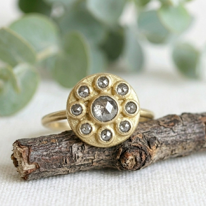 Antique Cut Salt and Pepper Diamond Ring, Vintage Style, featuring a round rose-cut salt-and-pepper diamond center stone surrounded by smaller rose-cut diamonds in a yellow gold cluster setting.