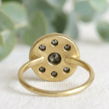 Antique Cut Salt and Pepper Diamond Ring, Vintage Style, featuring a round rose-cut salt-and-pepper diamond center stone surrounded by smaller rose-cut diamonds in a yellow gold cluster setting.