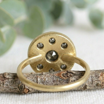 Antique Cut Salt and Pepper Diamond Ring, Vintage Style, featuring a round rose-cut salt-and-pepper diamond center stone surrounded by smaller rose-cut diamonds in a yellow gold cluster setting.