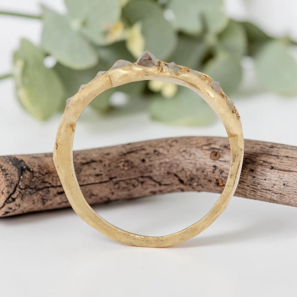 Baguette Cut Milky Diamond Ring featuring a 1.20 CT milky diamond center stone accented by two baguette cut milky diamond side stones in a handcrafted three stone design with a reverse tapered band and modern vintage inspired fine jewelry aesthetic.