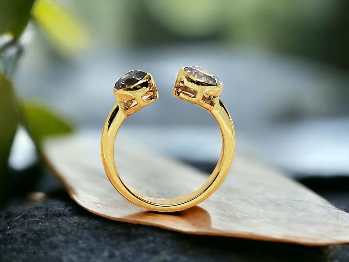 Dual Stone Diamond Ring Handmade Alternative Engagement Ring featuring two round rose cut natural salt and pepper diamonds in a yellow gold bezel setting with an open front minimalist design and straight shank.