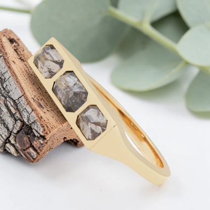 Emerald cut salt and pepper diamond bezel statement ring featuring a 1.20 CT natural center stone with two emerald cut side stones, handcrafted in a bold 4.50 mm reverse tapered minimalist fine jewelry design.