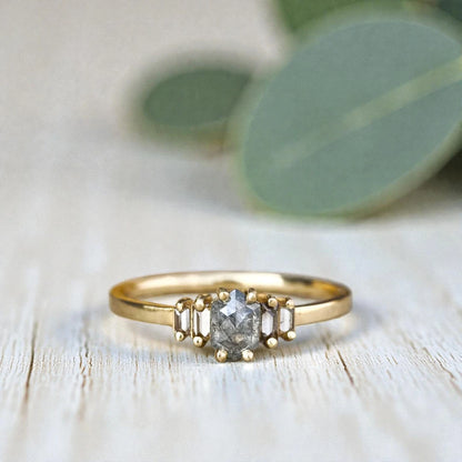 Handcrafted natural grey diamond ring featuring a unique engagement design with an organic grey diamond center stone set in a minimalist fine jewelry style band, showcasing raw natural inclusions and artisan craftsmanship.