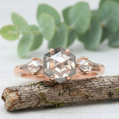 Hexagon Salt and Pepper Diamond Ring featuring a 1.51 CT natural salt and pepper hexagon cut diamond with galaxy-like inclusions, accented by kite-shaped diamond side stones in a modern geometric design with a straight 1.80 mm band in fine gold.