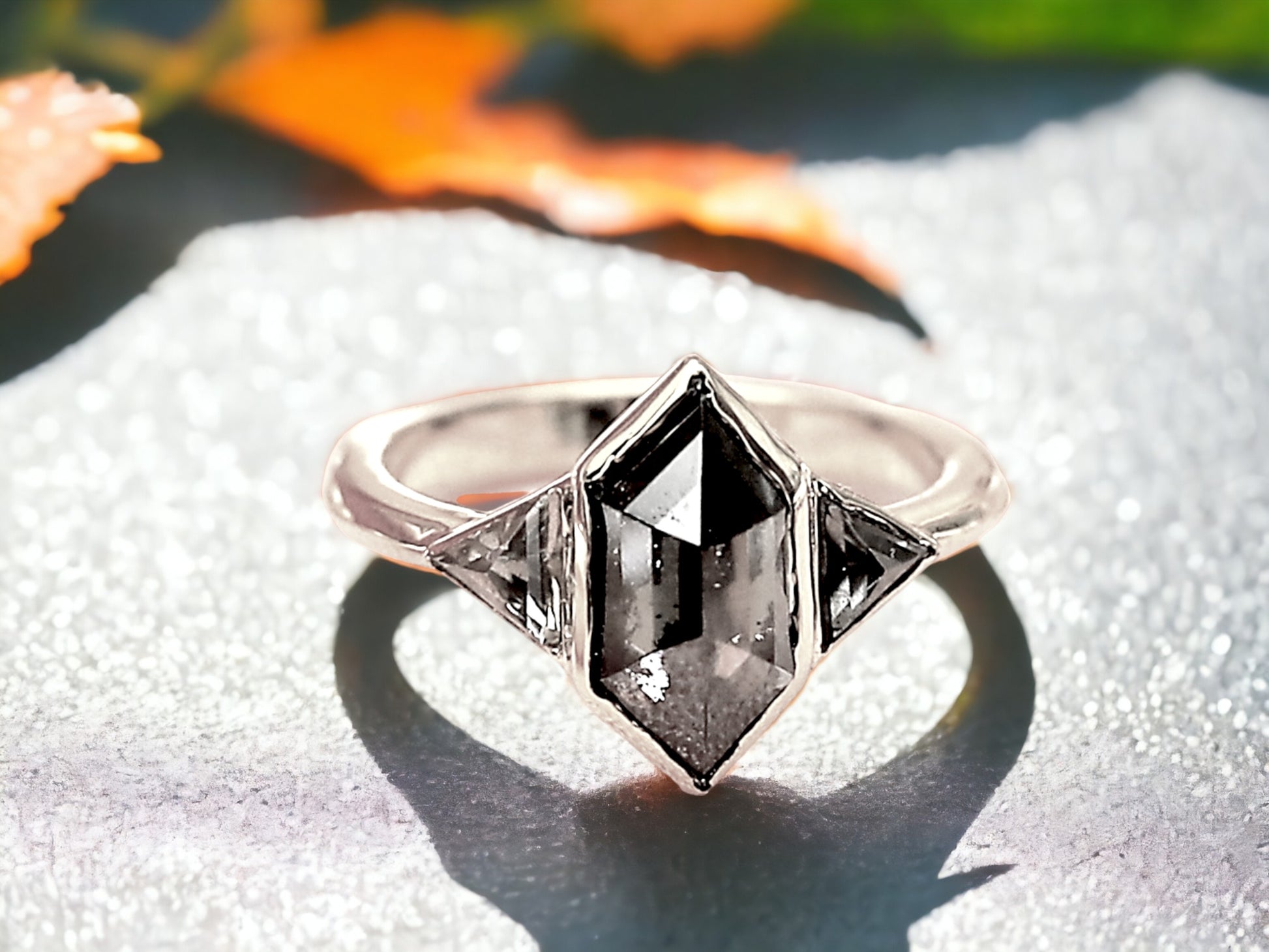 Hexagon Salt and Pepper Diamond Ring featuring a 2.07 CT natural hexagon cut salt and pepper diamond with galaxy-like inclusions, accented by triangle cut salt and pepper side stones in a rustic handmade contemporary design with a straight shank, created as an alternative engagement ring.
