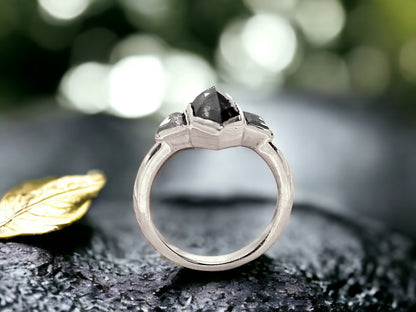 Hexagon Salt and Pepper Diamond Ring featuring a 2.07 CT natural hexagon cut salt and pepper diamond with galaxy-like inclusions, accented by triangle cut salt and pepper side stones in a rustic handmade contemporary design with a straight shank, created as an alternative engagement ring.