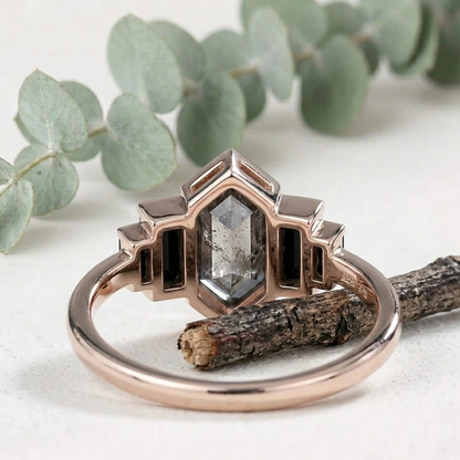 Hexagon Salt and Pepper Diamond Ring featuring a natural 5.10 mm hexagon cut salt and pepper diamond with organic inclusions, accented by black baguette cut diamonds in a contemporary geometric design with a slim straight shank band.