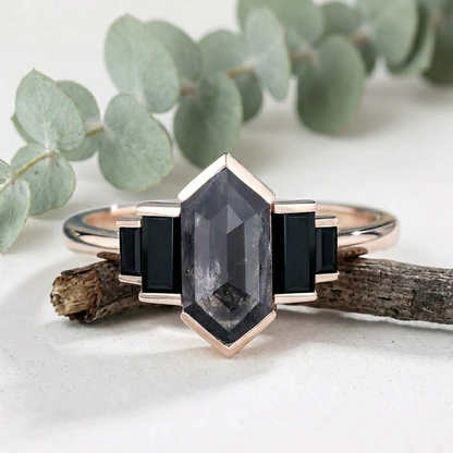 Hexagon Salt and Pepper Diamond Ring featuring a natural 5.10 mm hexagon cut salt and pepper diamond with organic inclusions, accented by black baguette cut diamonds in a contemporary geometric design with a slim straight shank band.