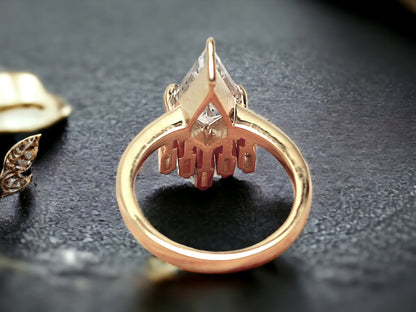 Kite Cut Salt and Pepper Diamond Ring featuring a 2.40 CT natural salt-and-pepper kite-cut diamond with galaxy-like inclusions, accented by 0.70 CT baguette-cut side stones in a minimalist geometric gold design with a straight 1.80 mm band.