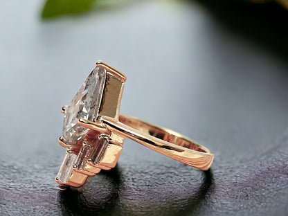 Kite Cut Salt and Pepper Diamond Ring featuring a 2.40 CT natural salt-and-pepper kite-cut diamond with galaxy-like inclusions, accented by 0.70 CT baguette-cut side stones in a minimalist geometric gold design with a straight 1.80 mm band.