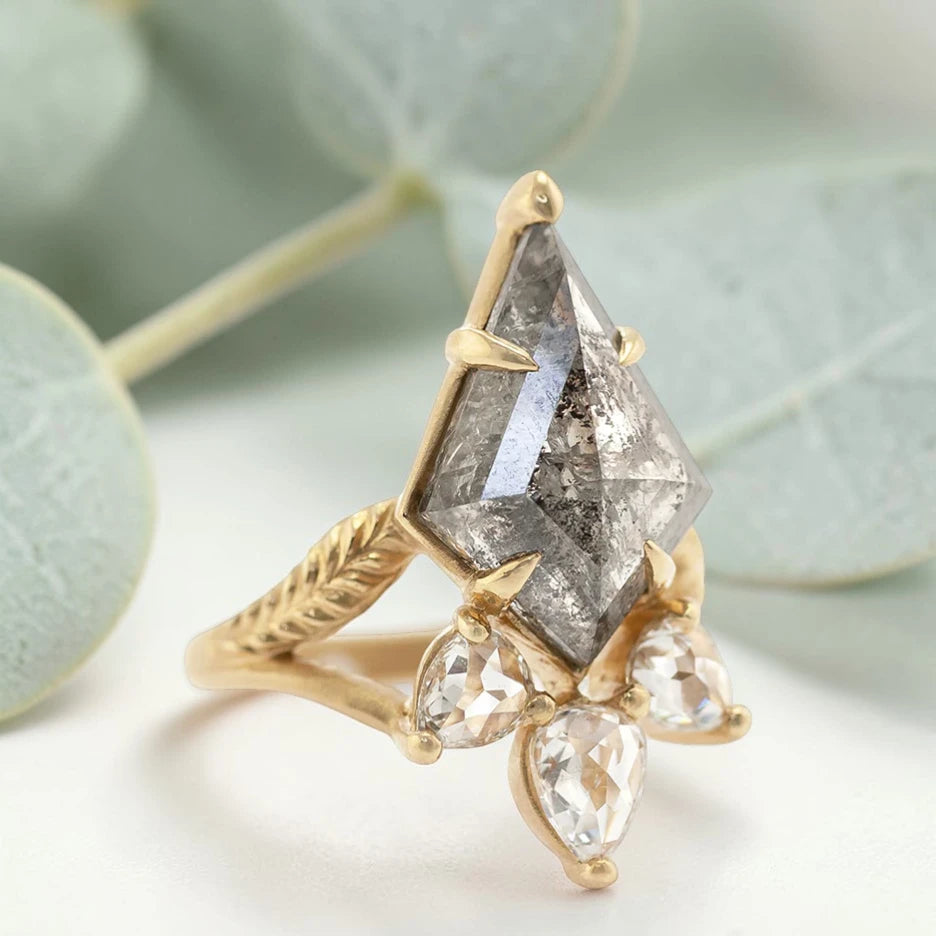 Kite Rose Cut Salt and Pepper Diamond Ring featuring a 5.75 CT natural salt and pepper diamond with galaxy-like inclusions, accented by pear rose cut side diamonds in a handmade split shank nature inspired engagement ring design.