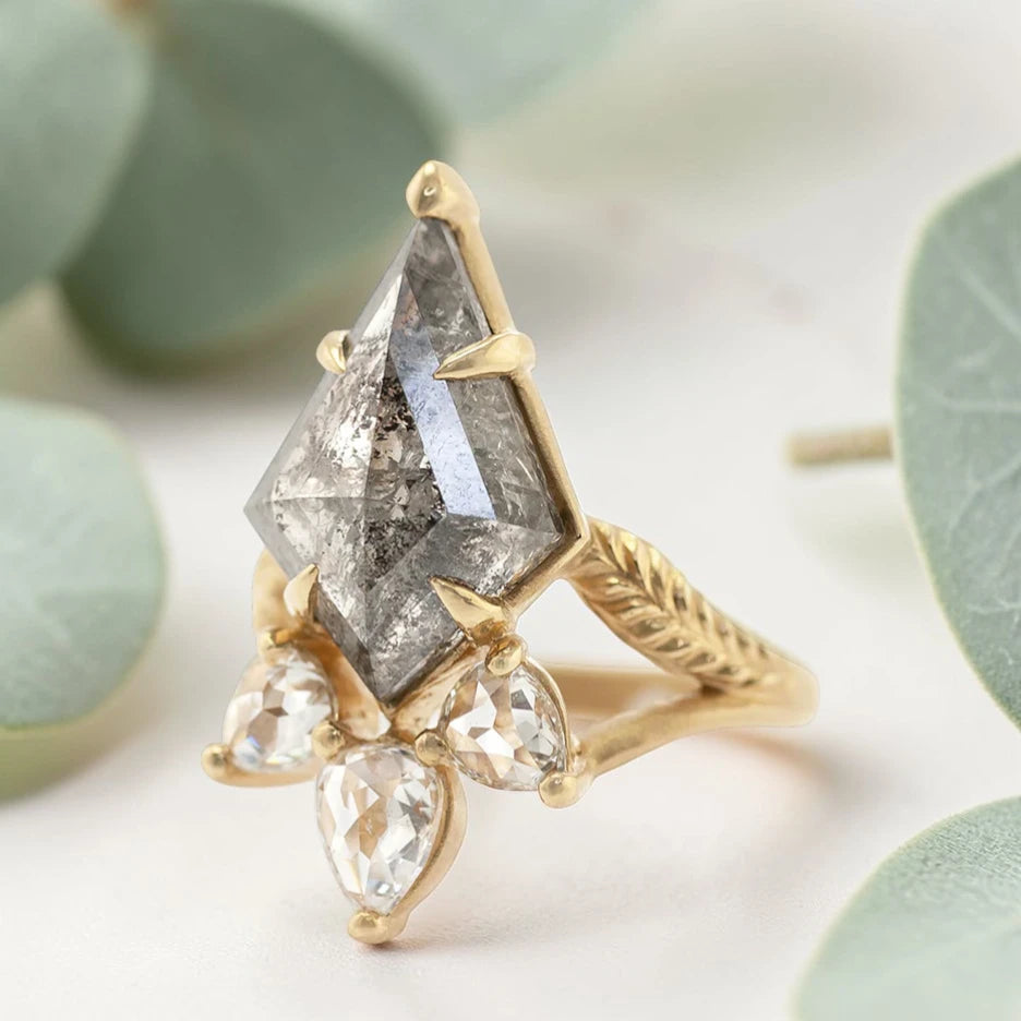 Kite Rose Cut Salt and Pepper Diamond Ring featuring a 5.75 CT natural salt and pepper diamond with galaxy-like inclusions, accented by pear rose cut side diamonds in a handmade split shank nature inspired engagement ring design.