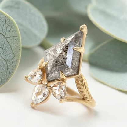 Kite Rose Cut Salt and Pepper Diamond Ring featuring a 5.75 CT natural salt and pepper diamond with galaxy-like inclusions, accented by pear rose cut side diamonds in a handmade split shank nature inspired engagement ring design.