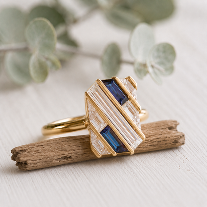 Lab Grown Sapphire Diamond Engagement Ring featuring rectangular step cut lab grown diamonds totaling 0.50 CT accented by sapphire stones in a contemporary geometric gold setting with a slim 1.6 mm band, designed as a modern minimalist engagement ring.