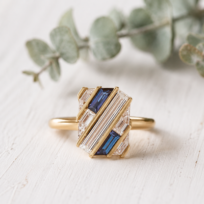 Lab Grown Sapphire Diamond Engagement Ring featuring rectangular step cut lab grown diamonds totaling 0.50 CT accented by sapphire stones in a contemporary geometric gold setting with a slim 1.6 mm band, designed as a modern minimalist engagement ring.