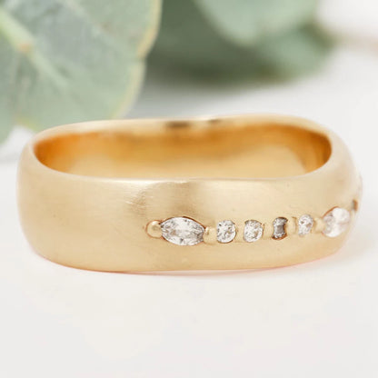 Marquise cut salt and pepper diamond wide statement ring featuring a 0.35 CT natural center stone with a 0.25 CT round cut accent diamond, handcrafted on a bold 5.65 mm straight band fine jewelry design.