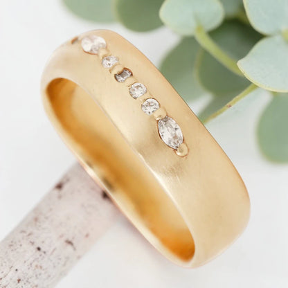 Marquise cut salt and pepper diamond wide statement ring featuring a 0.35 CT natural center stone with a 0.25 CT round cut accent diamond, handcrafted on a bold 5.65 mm straight band fine jewelry design.