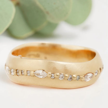 Marquise cut salt and pepper diamond wide statement ring featuring a 0.35 CT natural center stone with a 0.25 CT round cut accent diamond, handcrafted on a bold 5.65 mm straight band fine jewelry design.