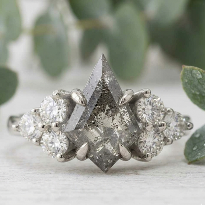Natural Salt and Pepper Diamond Ring featuring a 1.68 CT round rose cut center stone with organic inclusions, accented by lab-grown round diamonds in a four-stone symmetrical arrangement with a straight shank and 1.80 mm band, designed as a vintage-inspired engagement ring.
