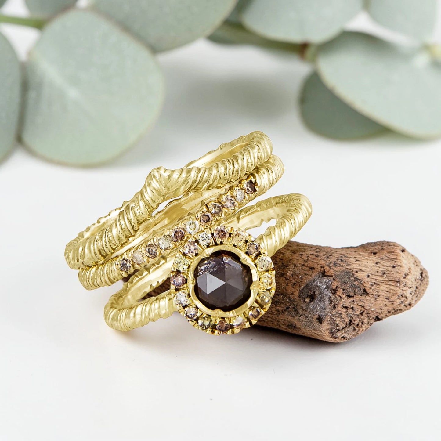 Organic Wide Band Salt and Pepper Diamond Ring featuring a 0.60 CT natural round center diamond with cognac champagne and black tones, surrounded by 27 salt and pepper diamonds in a handmade minimalist wide band design with organic aesthetic.