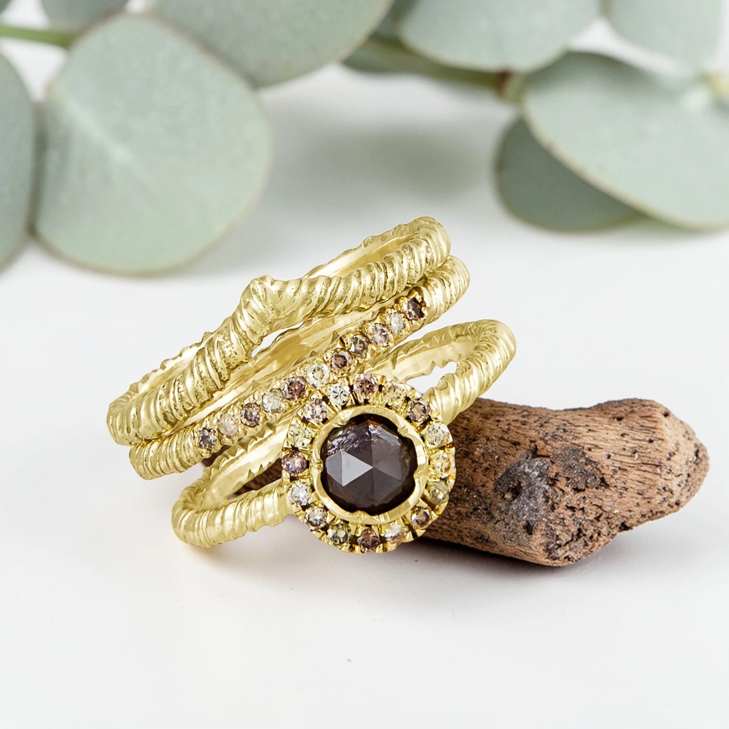 Organic Wide Band Salt and Pepper Diamond Ring featuring a 0.60 CT natural round center diamond with cognac champagne and black tones, surrounded by 27 salt and pepper diamonds in a handmade minimalist wide band design with organic aesthetic.