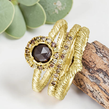 Organic Wide Band Salt and Pepper Diamond Ring featuring a 0.60 CT natural round center diamond with cognac champagne and black tones, surrounded by 27 salt and pepper diamonds in a handmade minimalist wide band design with organic aesthetic.