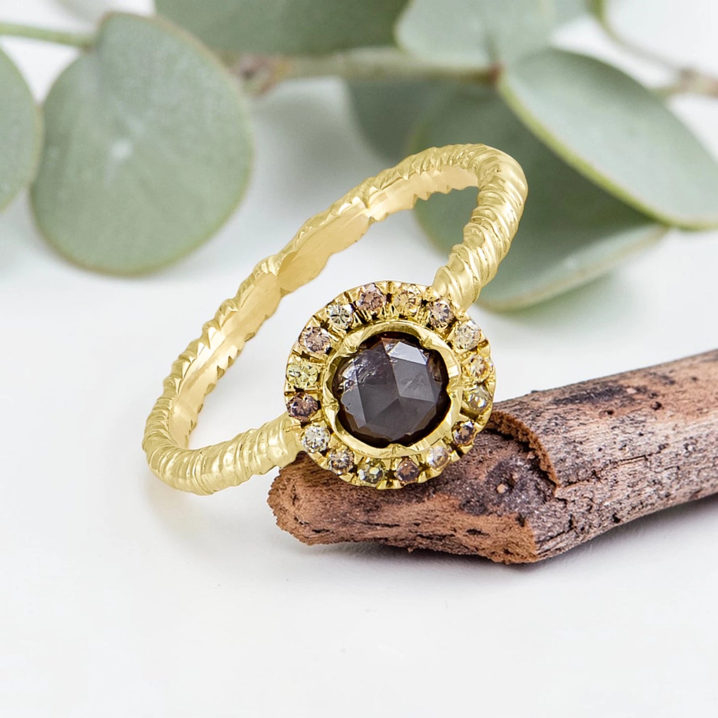 Organic Wide Band Salt and Pepper Diamond Ring featuring a 0.60 CT natural round center diamond with cognac champagne and black tones, surrounded by 27 salt and pepper diamonds in a handmade minimalist wide band design with organic aesthetic.