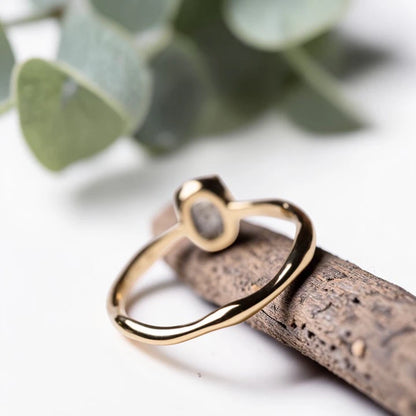Oval Rose Cut Salt and Pepper Diamond Ring featuring a 0.90 CT natural salt and pepper diamond with organic inclusions in a classic prong setting and handcrafted minimalist design with a reverse tapered 1.80 mm band suitable for engagement and everyday wear.