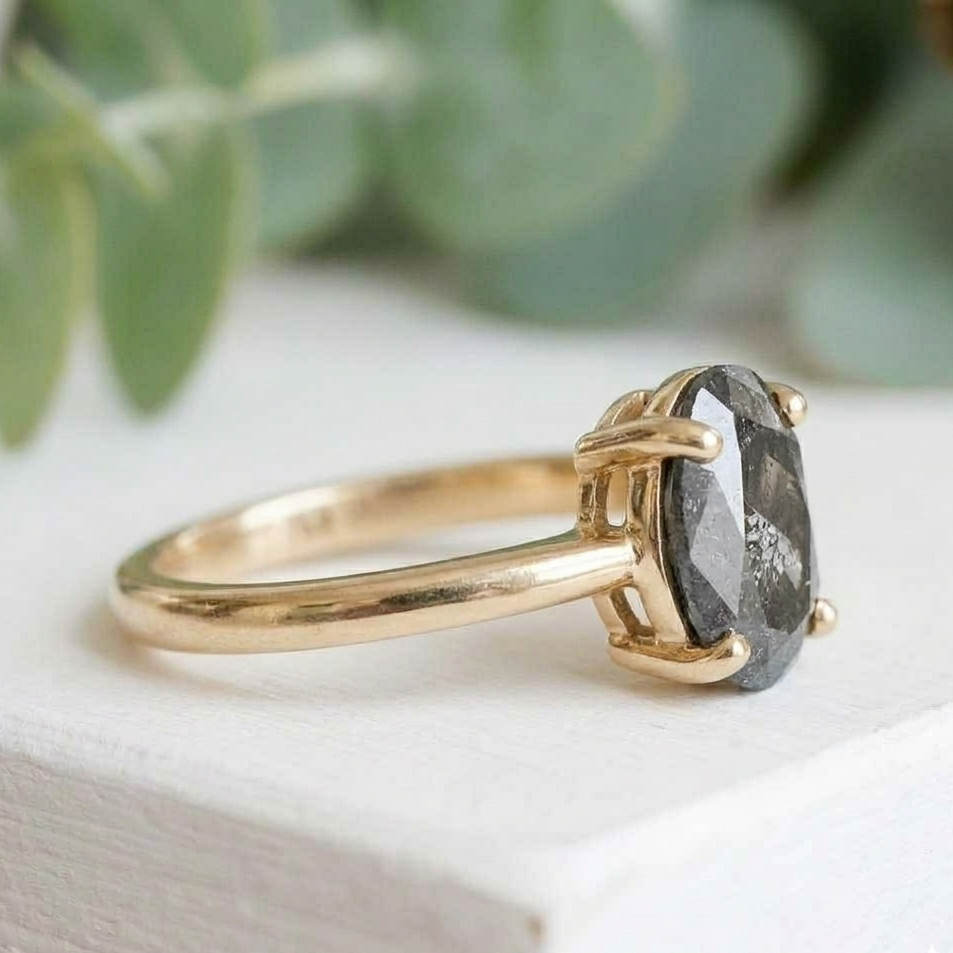 Oval Salt and Pepper Diamond Ring featuring a 2.07 CT natural salt and pepper diamond with galaxy-like internal inclusions in a minimalist design with a straight 1.90 mm band, crafted as a modern fine jewelry engagement and everyday wear ring.