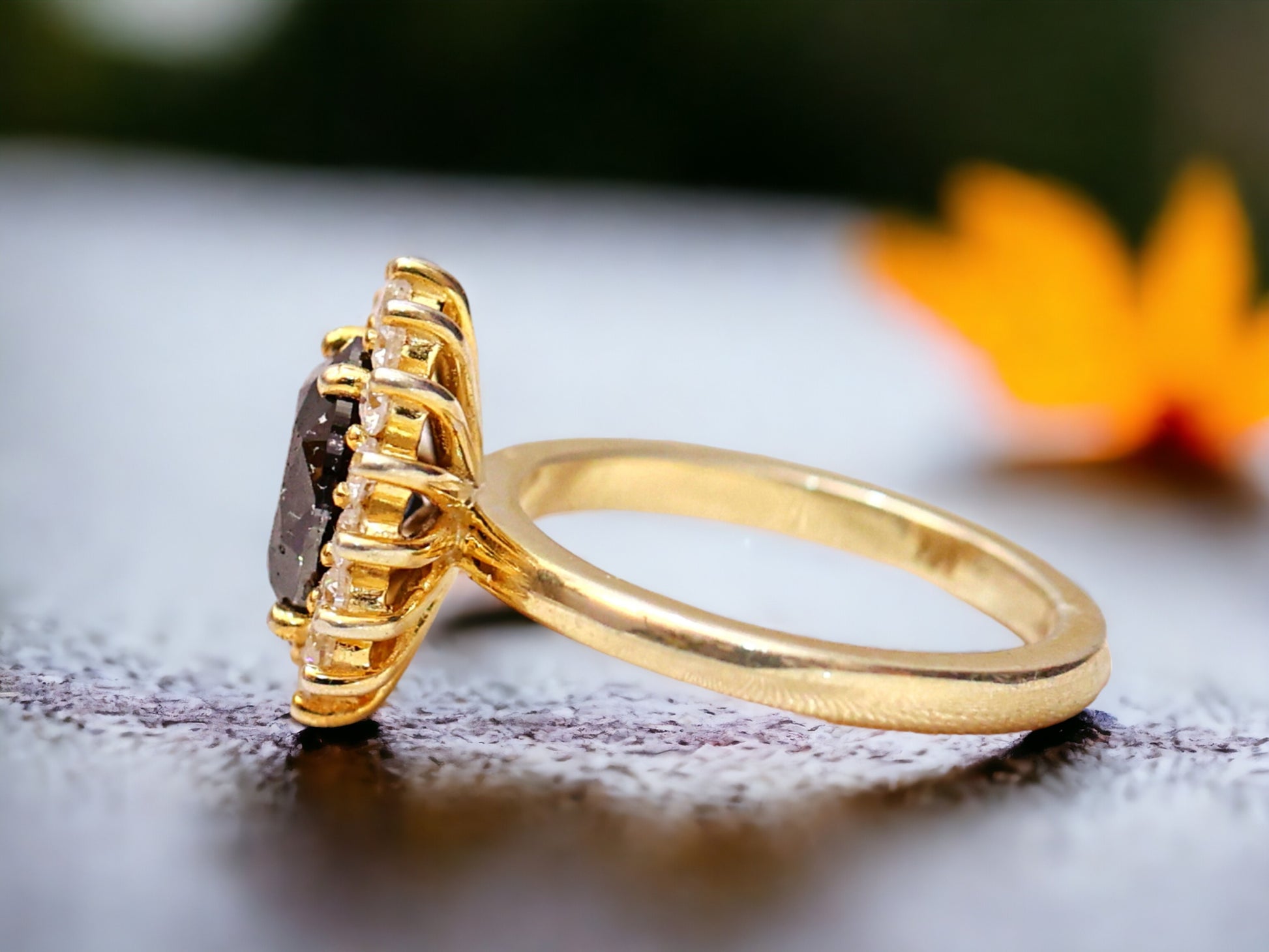 Oval Salt and Pepper Diamond Ring featuring a 2.10 CT natural salt and pepper diamond with galaxy-like inclusions, accented by round brilliant diamonds in a handcrafted bezel setting with a reverse tapered 2.50 mm band, designed as a minimalist statement engagement ring.