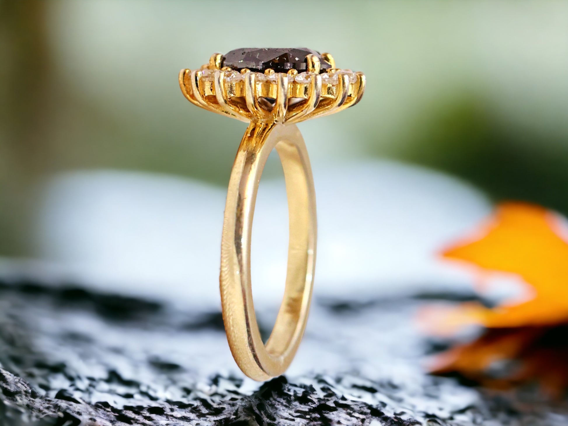 Oval Salt and Pepper Diamond Ring featuring a 2.10 CT natural salt and pepper diamond with galaxy-like inclusions, accented by round brilliant diamonds in a handcrafted bezel setting with a reverse tapered 2.50 mm band, designed as a minimalist statement engagement ring.