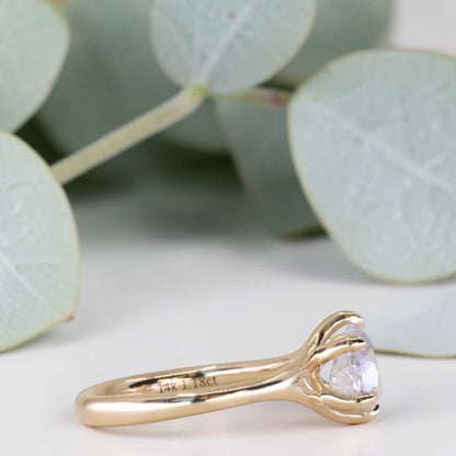 Pear cut salt and pepper diamond engagement ring featuring a 1.21 CT natural diamond with unique inclusions, set on a handcrafted split shank band in a minimalist alternative bridal jewelry design.