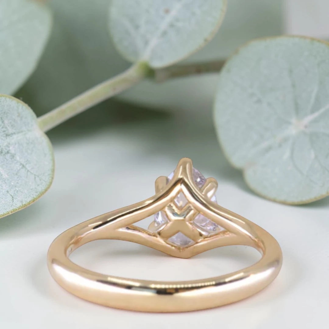 Pear cut salt and pepper diamond engagement ring featuring a 1.21 CT natural diamond with unique inclusions, set on a handcrafted split shank band in a minimalist alternative bridal jewelry design.