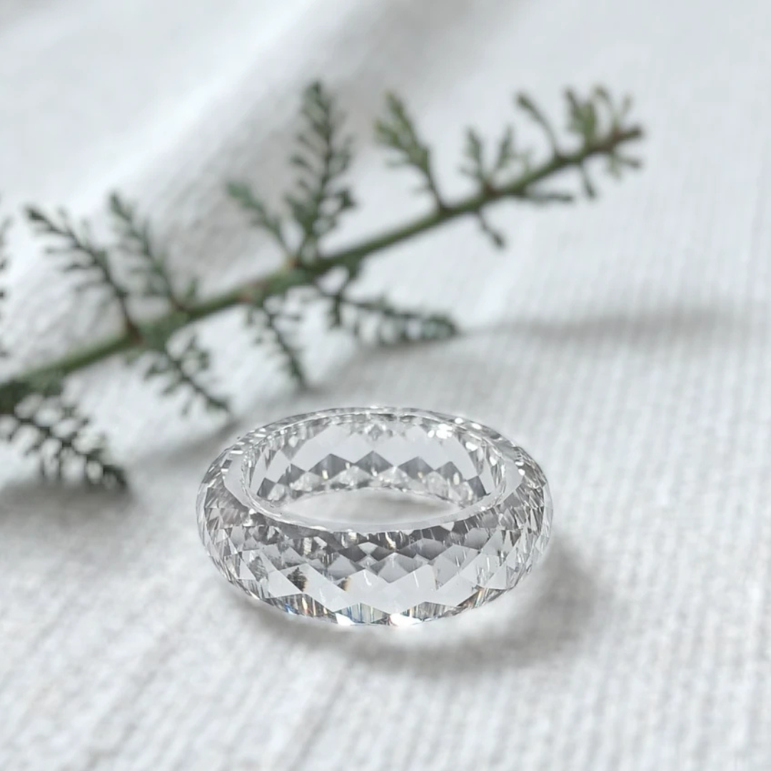Pinalia’s signature ring featuring a distinctive natural diamond design with handcrafted fine jewelry detailing, showcasing a modern minimalist aesthetic and unique organic gemstone character in an elegant engagement style ring.