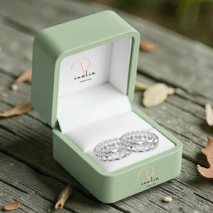 Pinalia’s signature ring featuring a distinctive natural diamond design with handcrafted fine jewelry detailing, showcasing a modern minimalist aesthetic and unique organic gemstone character in an elegant engagement style ring.