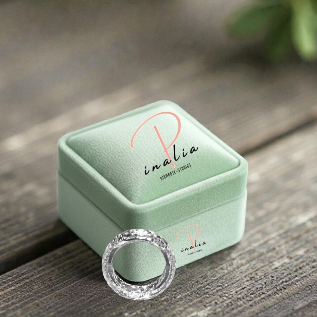 Pinalia’s signature ring featuring a distinctive natural diamond design with handcrafted fine jewelry detailing, showcasing a modern minimalist aesthetic and unique organic gemstone character in an elegant engagement style ring.