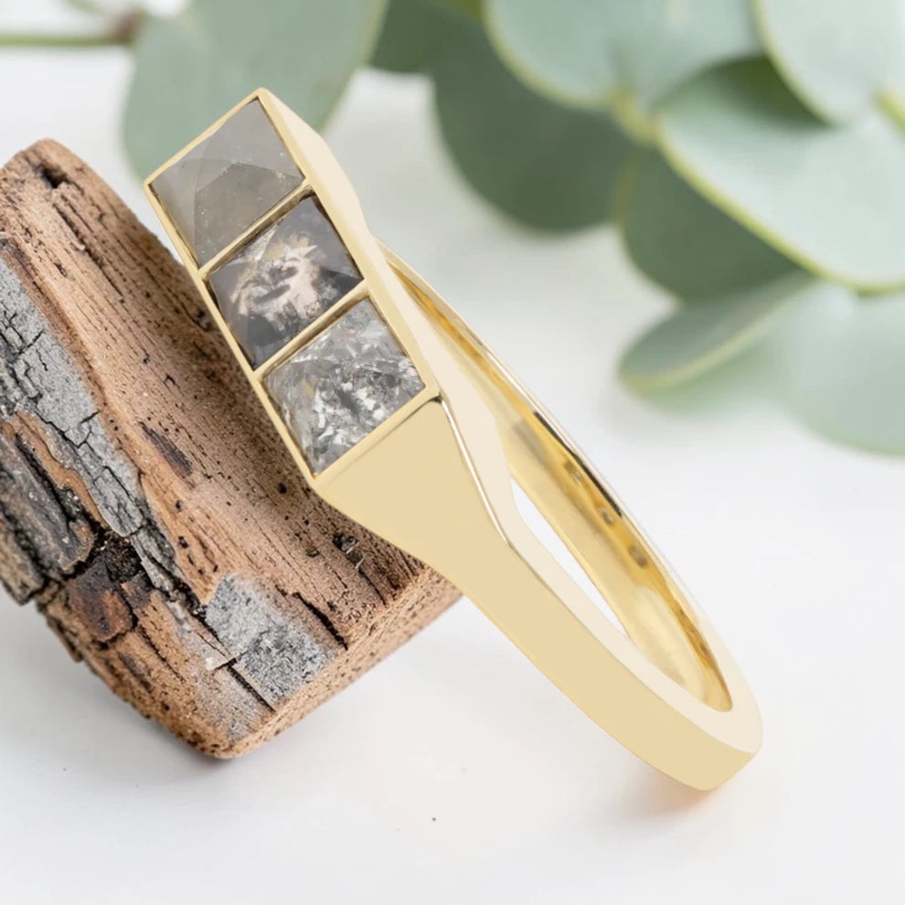 Princess cut salt and pepper diamond guardian bar engagement ring featuring a 0.95 CT gray natural diamond with unique inclusions, set on a reverse tapered handcrafted band in a modern vintage fusion design.