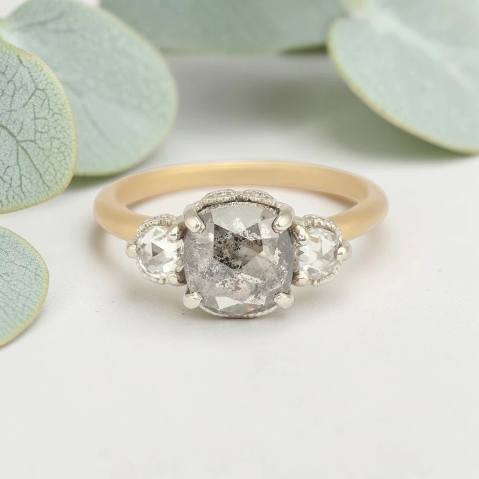 Rose cushion cut salt and pepper diamond vintage engagement ring featuring a 1.70 CT natural center diamond with galaxy-like inclusions and 0.35 CT round rose cut side diamonds on a handcrafted straight band design.