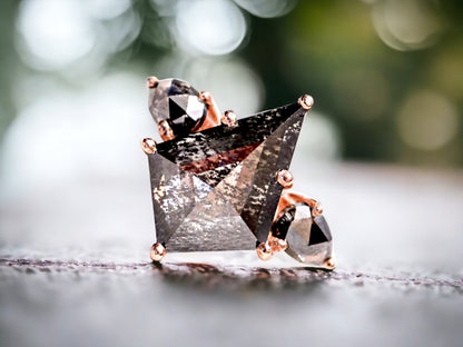 Rose Kite Cut Salt and Pepper Diamond Ring featuring a 5.87 CT natural salt and pepper diamond with smoky galaxy-like inclusions, accented by rose pear diamonds in a handmade modern engagement design with a straight 1.80 mm band and minimalist aesthetic.
