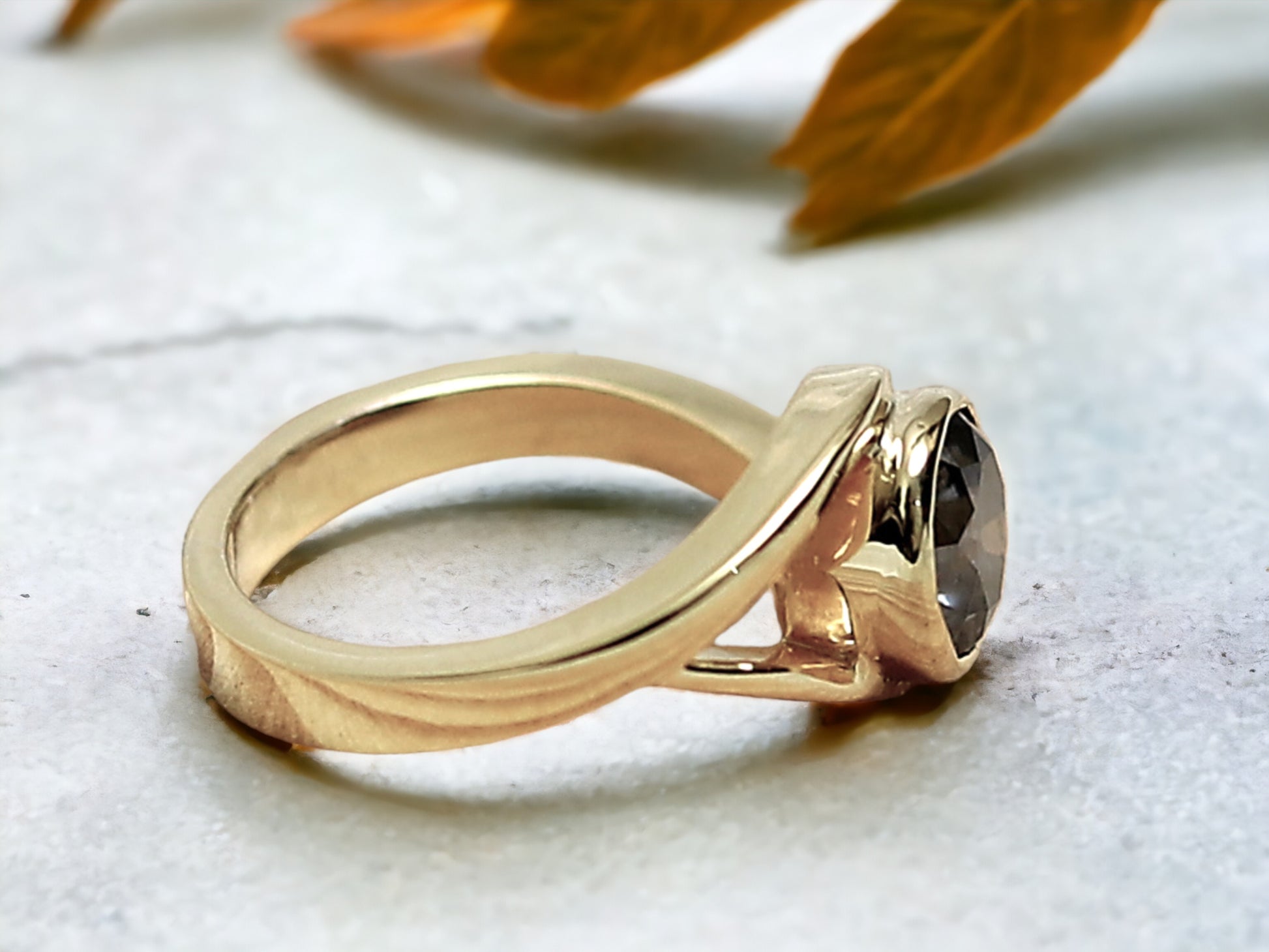 Round Brilliant Salt and Pepper Diamond Ring featuring a 1.75 CT natural salt and pepper diamond with galaxy-like black and white inclusions in a minimalist handcrafted gold design with a straight 1.8 to 1.9 mm band and rose cut finish.