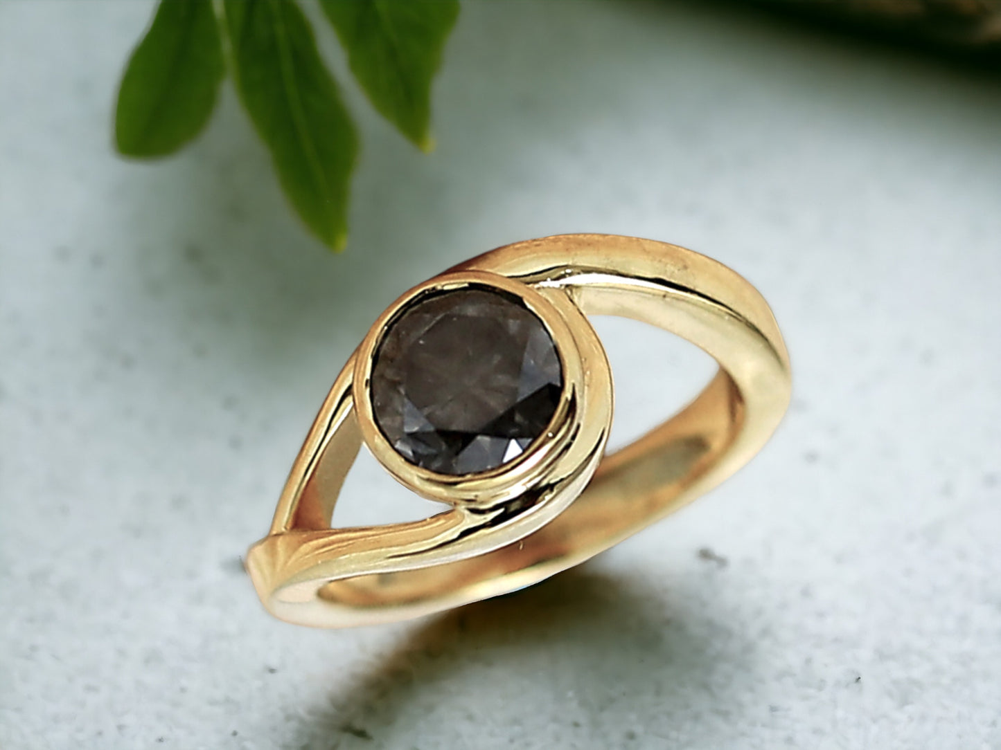 Round Brilliant Salt and Pepper Diamond Ring featuring a 1.75 CT natural salt and pepper diamond with galaxy-like black and white inclusions in a minimalist handcrafted gold design with a straight 1.8 to 1.9 mm band and rose cut finish.