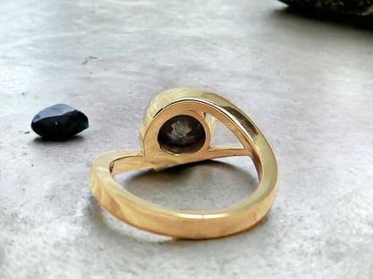 Round Brilliant Salt and Pepper Diamond Ring featuring a 1.75 CT natural salt and pepper diamond with galaxy-like black and white inclusions in a minimalist handcrafted gold design with a straight 1.8 to 1.9 mm band and rose cut finish.