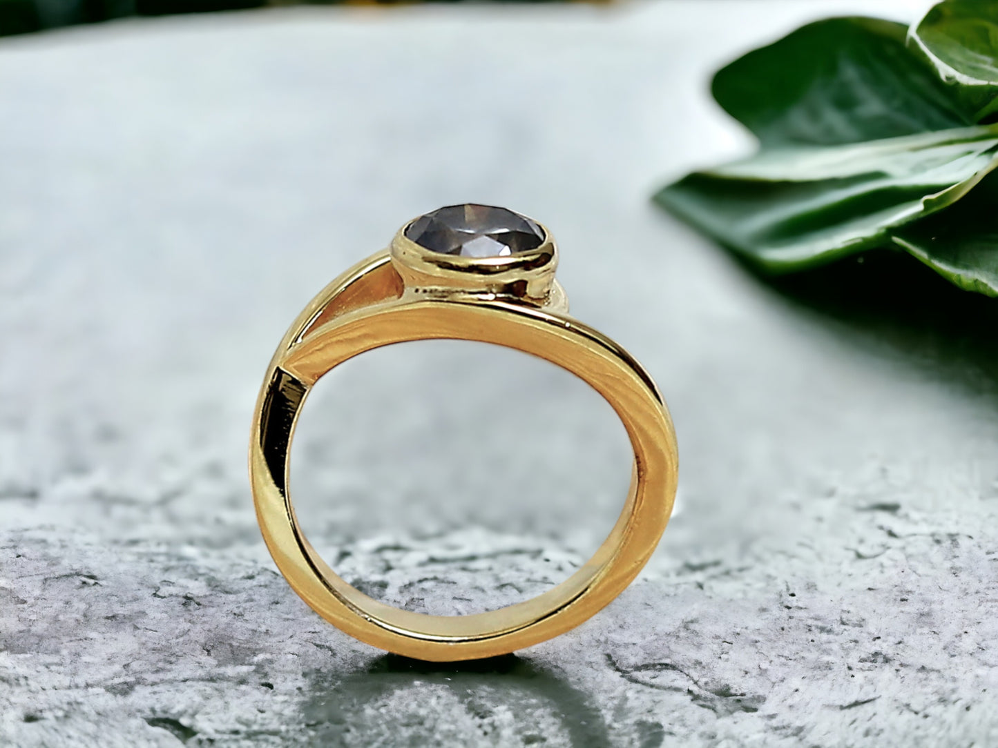 Round Brilliant Salt and Pepper Diamond Ring featuring a 1.75 CT natural salt and pepper diamond with galaxy-like black and white inclusions in a minimalist handcrafted gold design with a straight 1.8 to 1.9 mm band and rose cut finish.