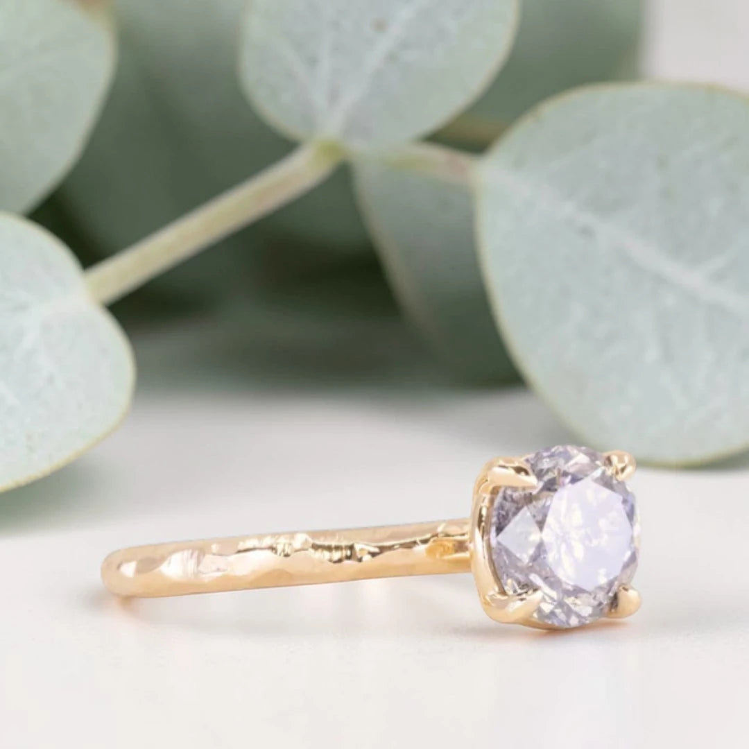 Round Brilliant Salt and Pepper Diamond Ring featuring a 1.60 CT natural black diamond with unique inclusions on a slim straight band in a handcrafted minimalist alternative engagement design.
