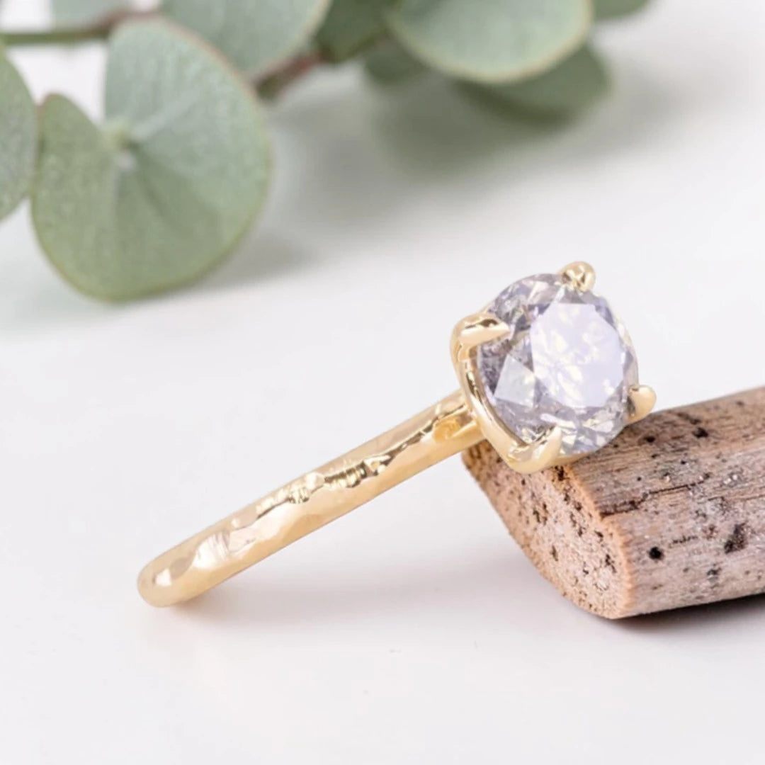 Round Brilliant Salt and Pepper Diamond Ring featuring a 1.60 CT natural black diamond with unique inclusions on a slim straight band in a handcrafted minimalist alternative engagement design.
