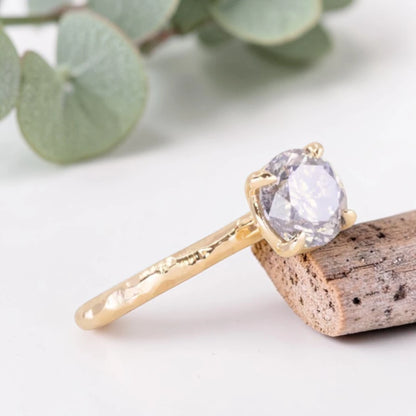 Round Brilliant Salt and Pepper Diamond Ring featuring a 1.60 CT natural black diamond with unique inclusions on a slim straight band in a handcrafted minimalist alternative engagement design.