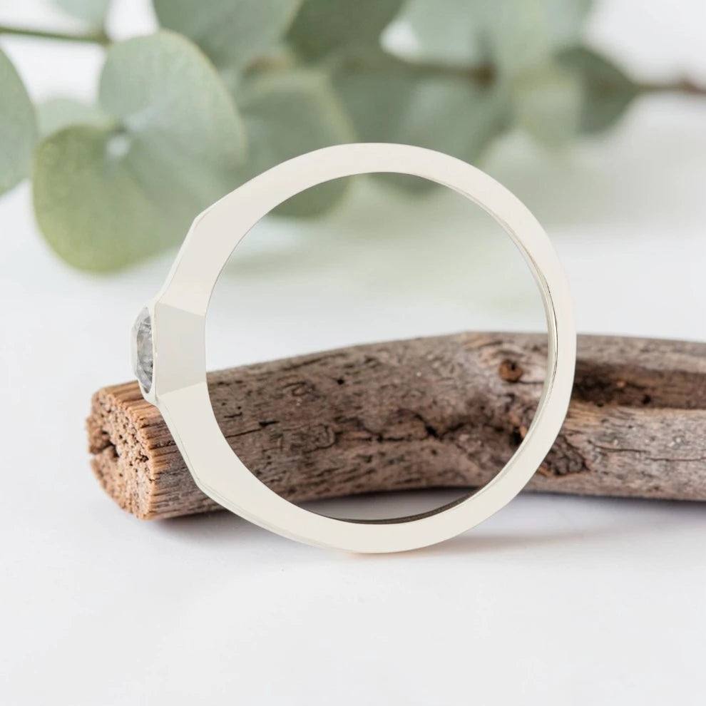 Round Cut Salt and Pepper Diamond Ring featuring a 0.27 CT natural salt and pepper diamond with organic inclusions in a minimalist handmade design with a reverse tapered 2.65 mm band and modern fine jewelry aesthetic.