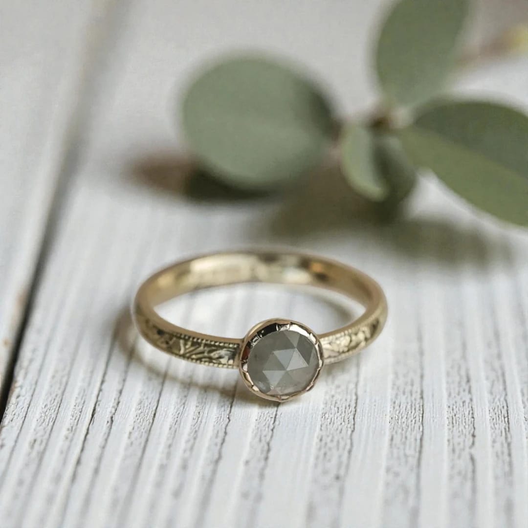 Round diamond ring inspired by ethical natural diamond beauty featuring a minimalist handcrafted design with a natural round diamond center stone and refined fine jewelry aesthetic suitable for engagement and everyday wear.